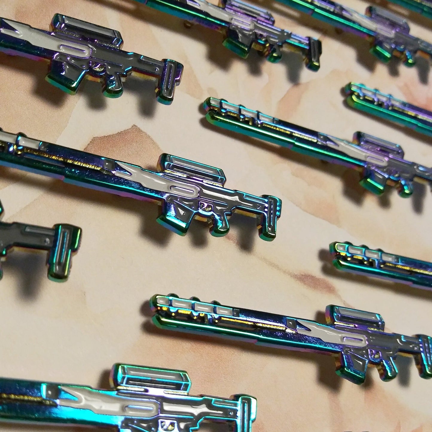 Rainbow gun enamel pin