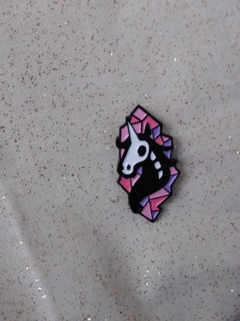 Dead unicorn pin
